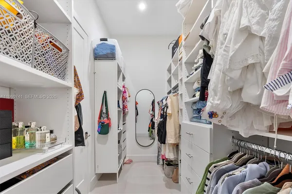 a bathroom with a bathtub and a sink