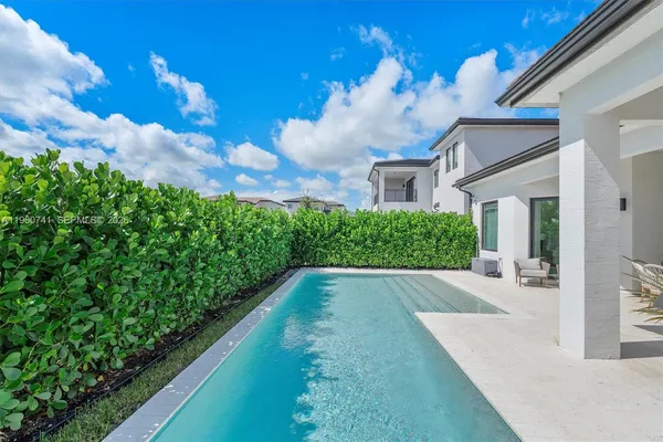 a view of an outdoor sitting area with furniture