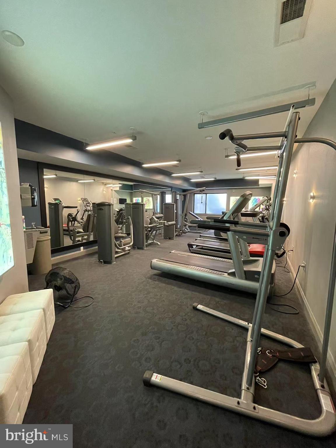 8005 13th Street, Unit 310 Silver Spring, MD 20910 - Photo 4 of 11 a gym hall with exercise machine