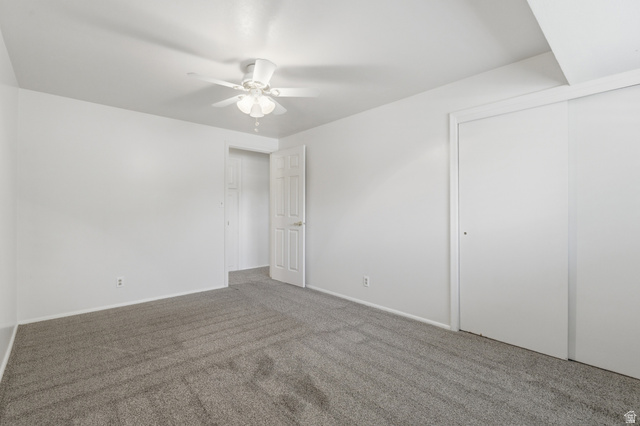 148 Tennyson Avenue Sandy, UT 84070 - Photo 27 of 55 Neutral white walls and ceiling fan with light fixture