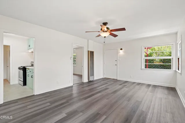 a kitchen that has a sink and a stove