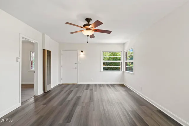 a kitchen that has a sink and a stove
