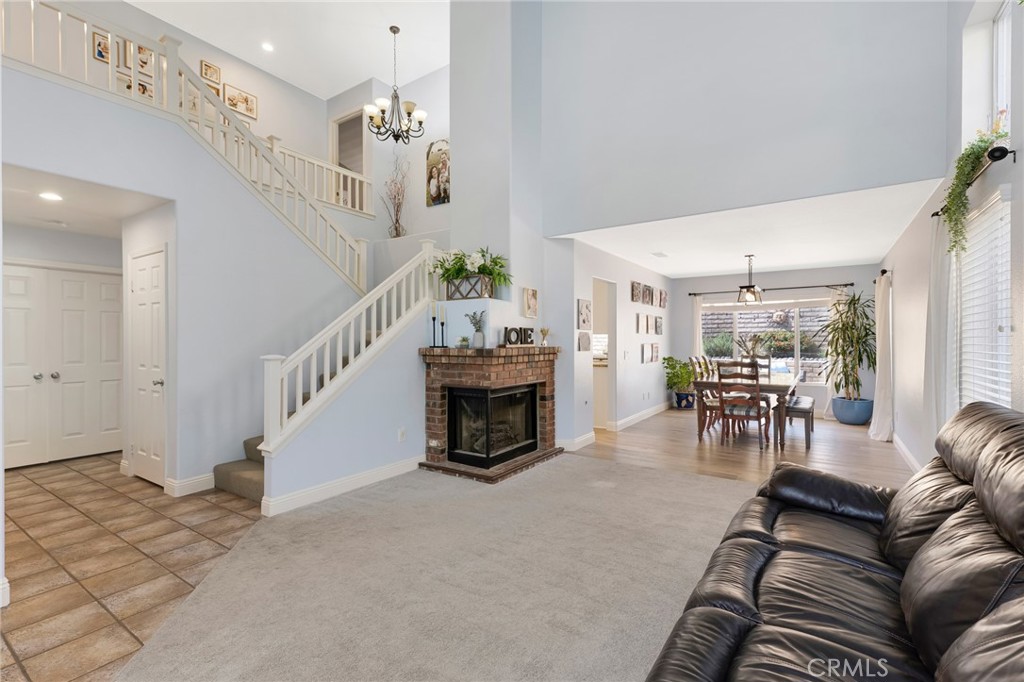 3843 San Gabriel Street Simi Valley, CA 93063 - Photo 12 of 52 a living room with furniture and a fireplace
