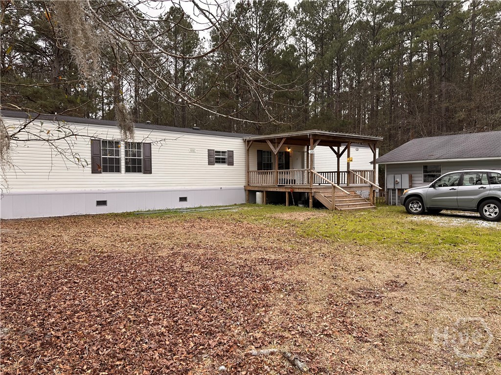 219-221 John Carter Road Bloomingdale, GA 31302 - Photo 17 of 46 221 front of home