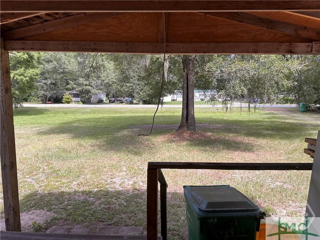 219-221 John Carter Road Bloomingdale, GA 31302 - Photo 3 of 46 219 view from porch