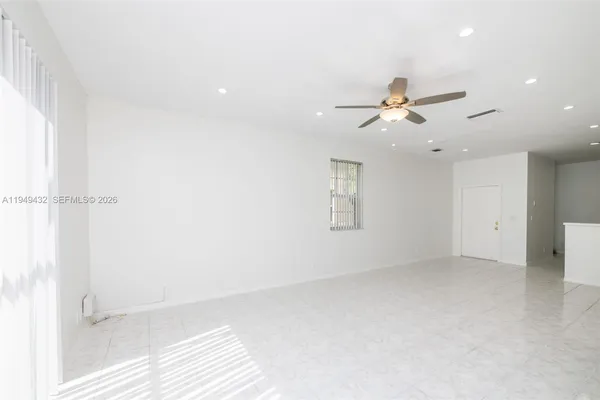 a view of a hallway with staircase