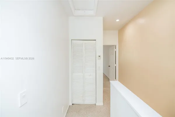 a view of a house with a yard and plants