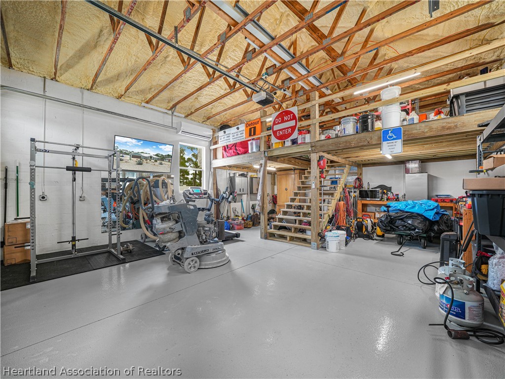 5430 Lakewood Road Sebring, FL 33875 - Photo 33 of 40 a view of a storage room with a table and chairs
