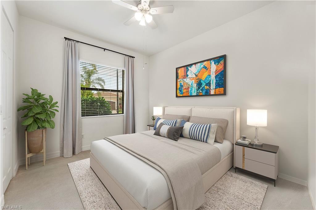 11989 Five Waters Circle Fort Myers, FL 33913 - Photo 20 of 32 a bedroom with a bed and a painting on the wall