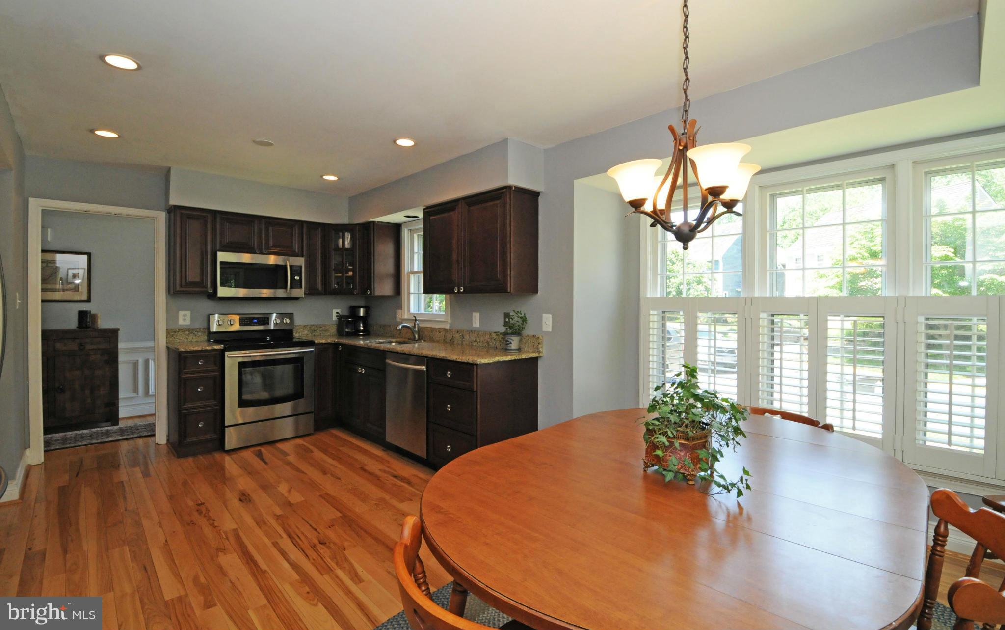 2101 Salt Kettle Way Reston, VA 20191 - Photo 12 of 30 BREAKFAST AREA HAS PLANTATION SHUTTERS