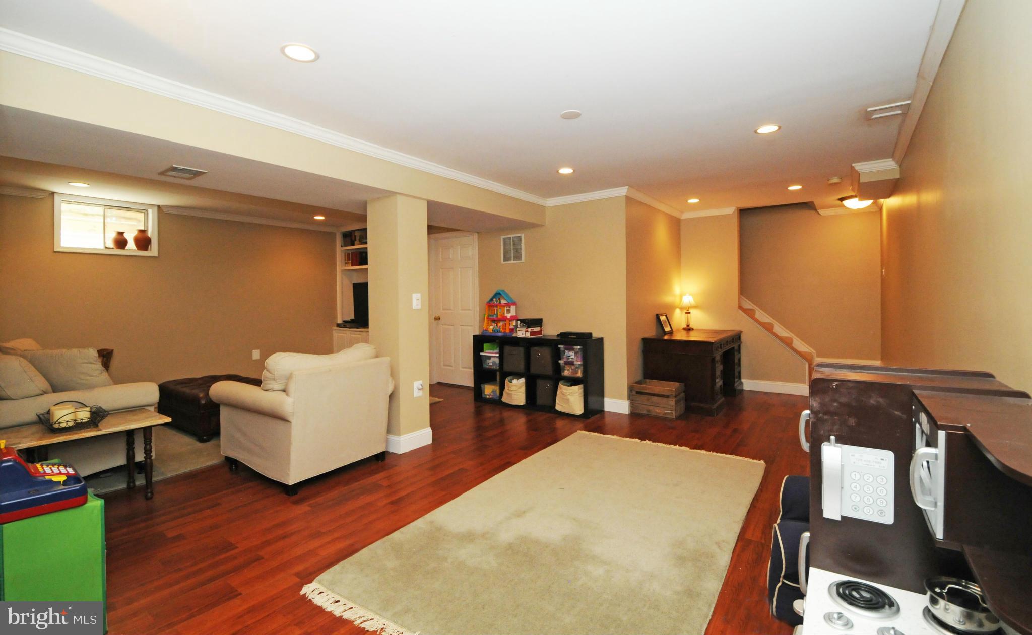 2101 Salt Kettle Way Reston, VA 20191 - Photo 25 of 30 REC ROOM WITH PRACTICAL LAMINATE