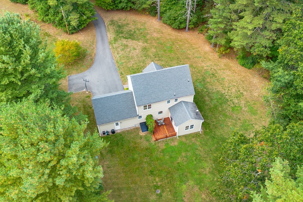 3 Gilson Road Littleton, MA 01460 - Photo 11 of 36 an aerial view of a house with garden space and street view