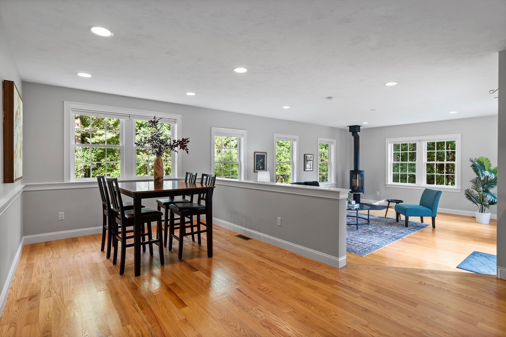 3 Gilson Road Littleton, MA 01460 - Photo 19 of 36 a dining room with furniture and wooden floor