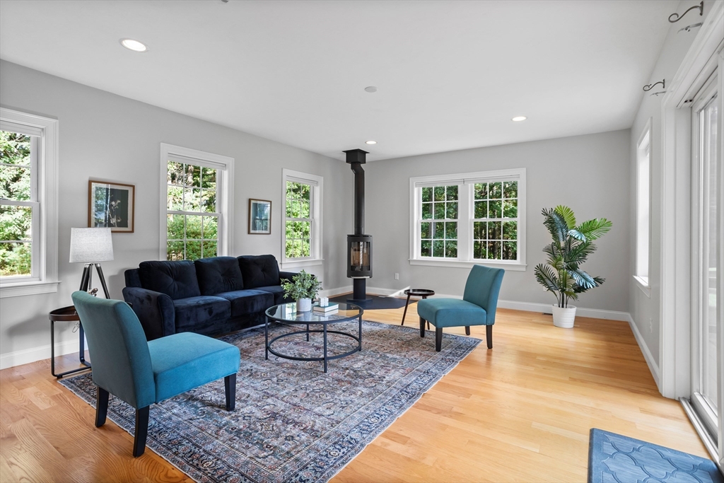 3 Gilson Road Littleton, MA 01460 - Photo 20 of 36 a living room with furniture and a rug