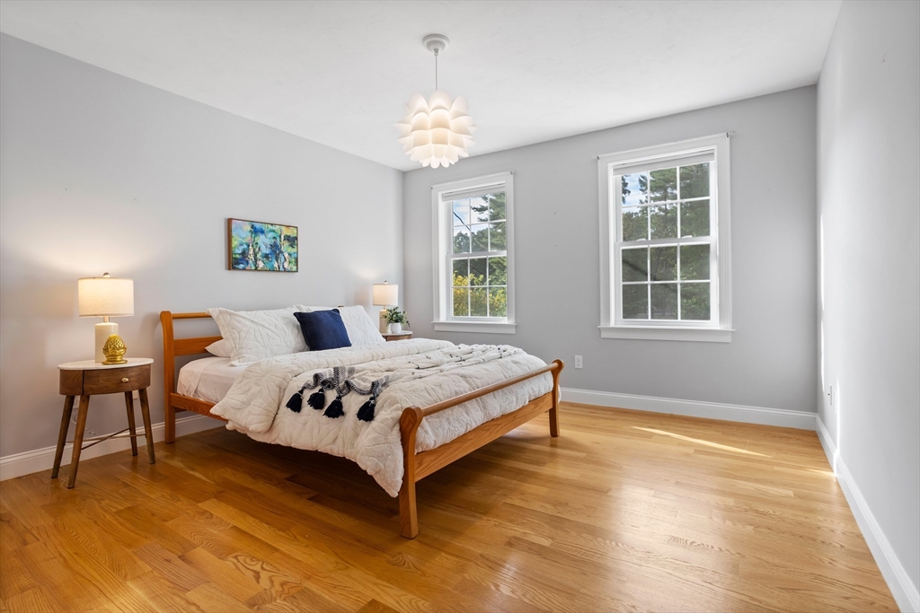 3 Gilson Road Littleton, MA 01460 - Photo 29 of 36 a bedroom with a bed and a window