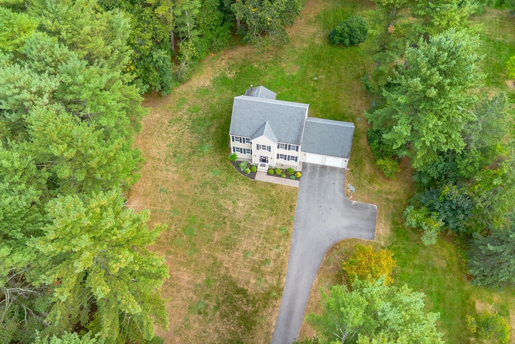 3 Gilson Road Littleton, MA 01460 - Photo 10 of 36 aerial view of a house with outdoor space and trees all around