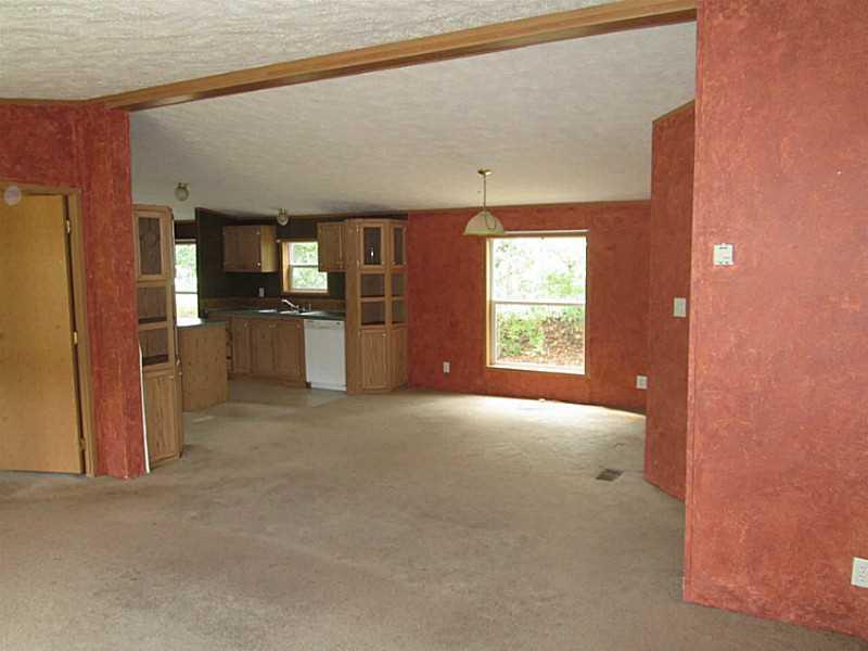2225 Maple Road New Bethlehem, PA 16242 - Photo 5 of 11 Living Room. A view from the livingroom into the kitchen.