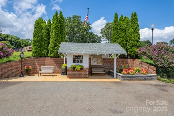 a view of an house with outdoor space and street view