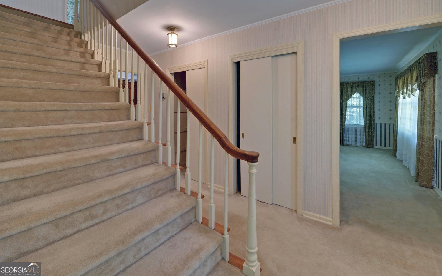 400 Harris Street Toccoa, GA 30577 - Photo 3 of 49 a view of entryway with wooden floor and stairs