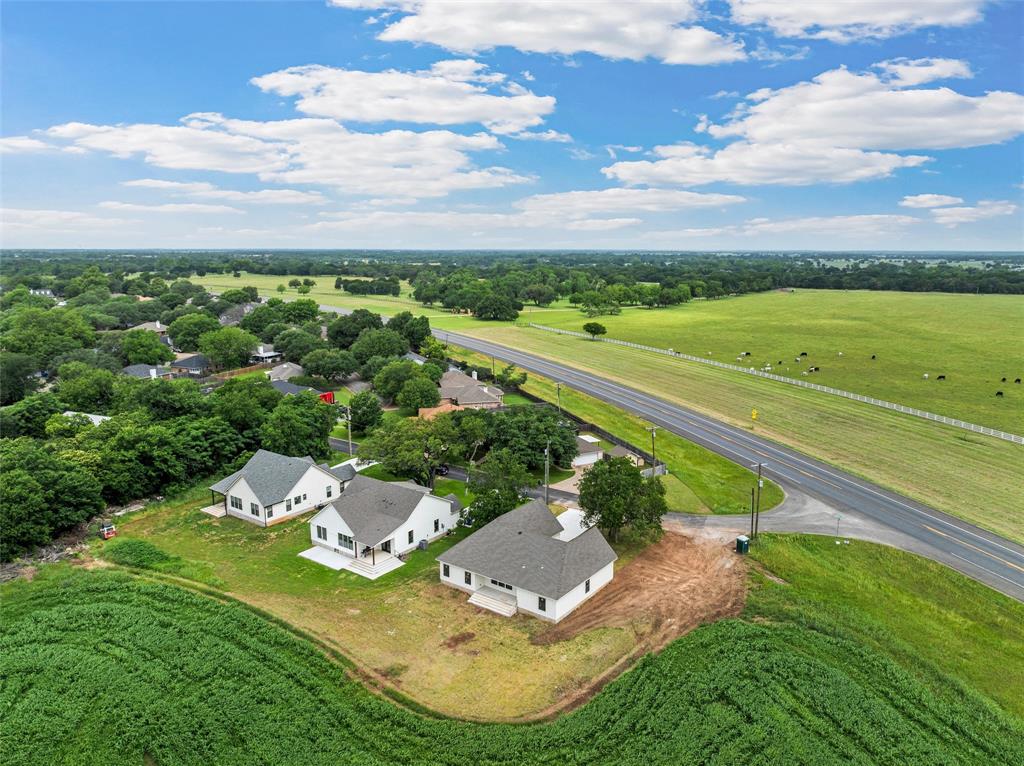 5200 Bogey Lane Waco, TX 76708 - Photo 35 of 37 an aerial view of a house with garden space and ocean view