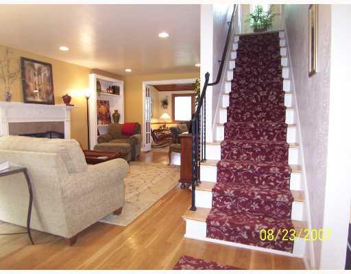 1935 Spring Valley Road Pittsburgh, PA 15243 - Photo 6 of 8 Living Room. Entry leads to Living Room, stairs, and Dining Room.