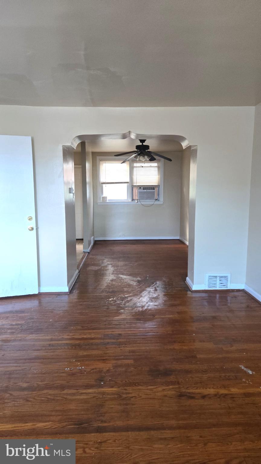 5202 F Street Philadelphia, PA 19124 - Photo 2 of 14 a view of empty room with window and wooden floor