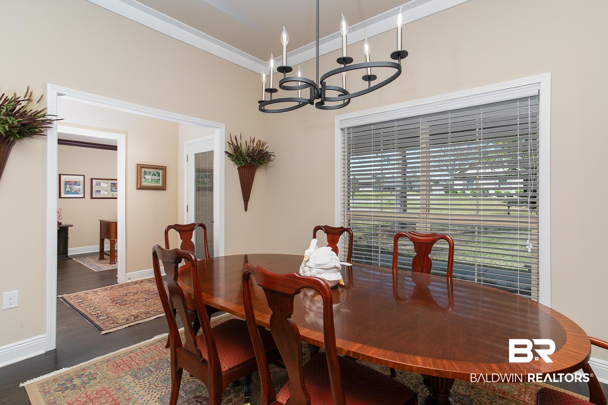 13154 Vincent Court Foley, AL 36535 - Photo 7 of 41 Dining area featuring an inviting chandelier, dark wood-type flooring, and baseboards