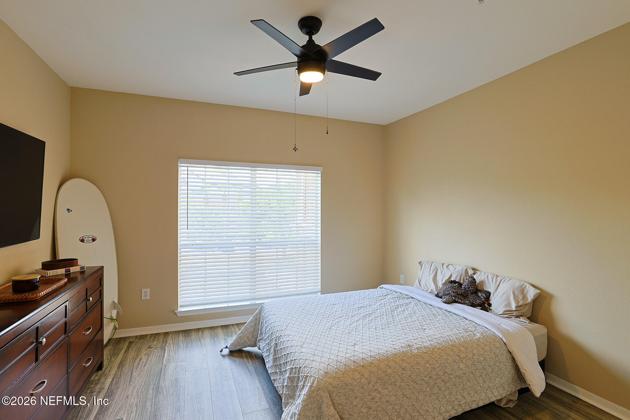 10961 Burnt Mill Road, Unit 426 Jacksonville, FL 32256 - Photo 12 of 24 a bedroom with a bed and a window