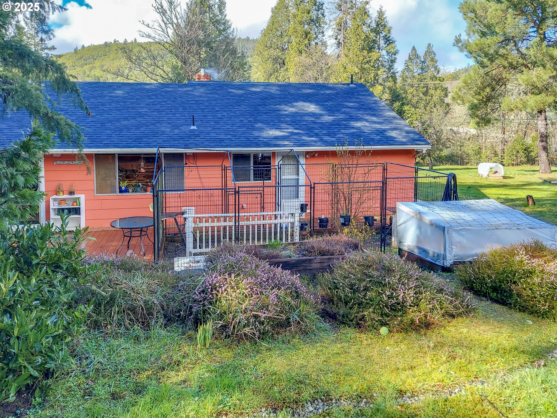 1260 Canyonville-Riddle Road Riddle, OR 97469 - Photo 26 of 44 a view of front of a house with a yard