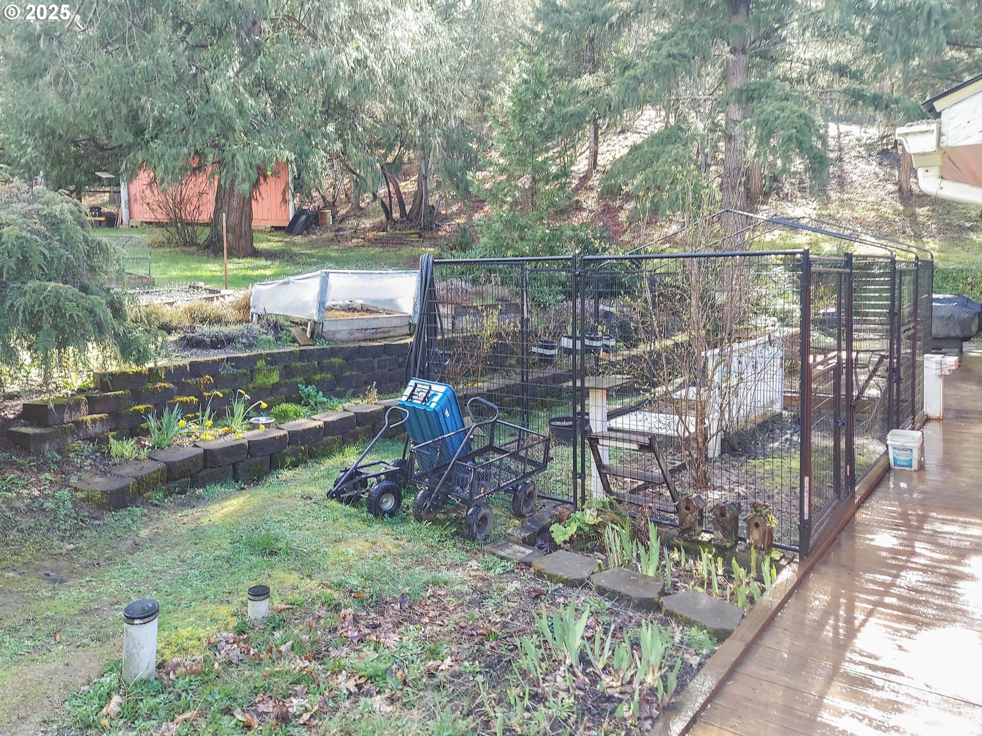 1260 Canyonville-Riddle Road Riddle, OR 97469 - Photo 28 of 44 a view of a chairs and table in a backyard