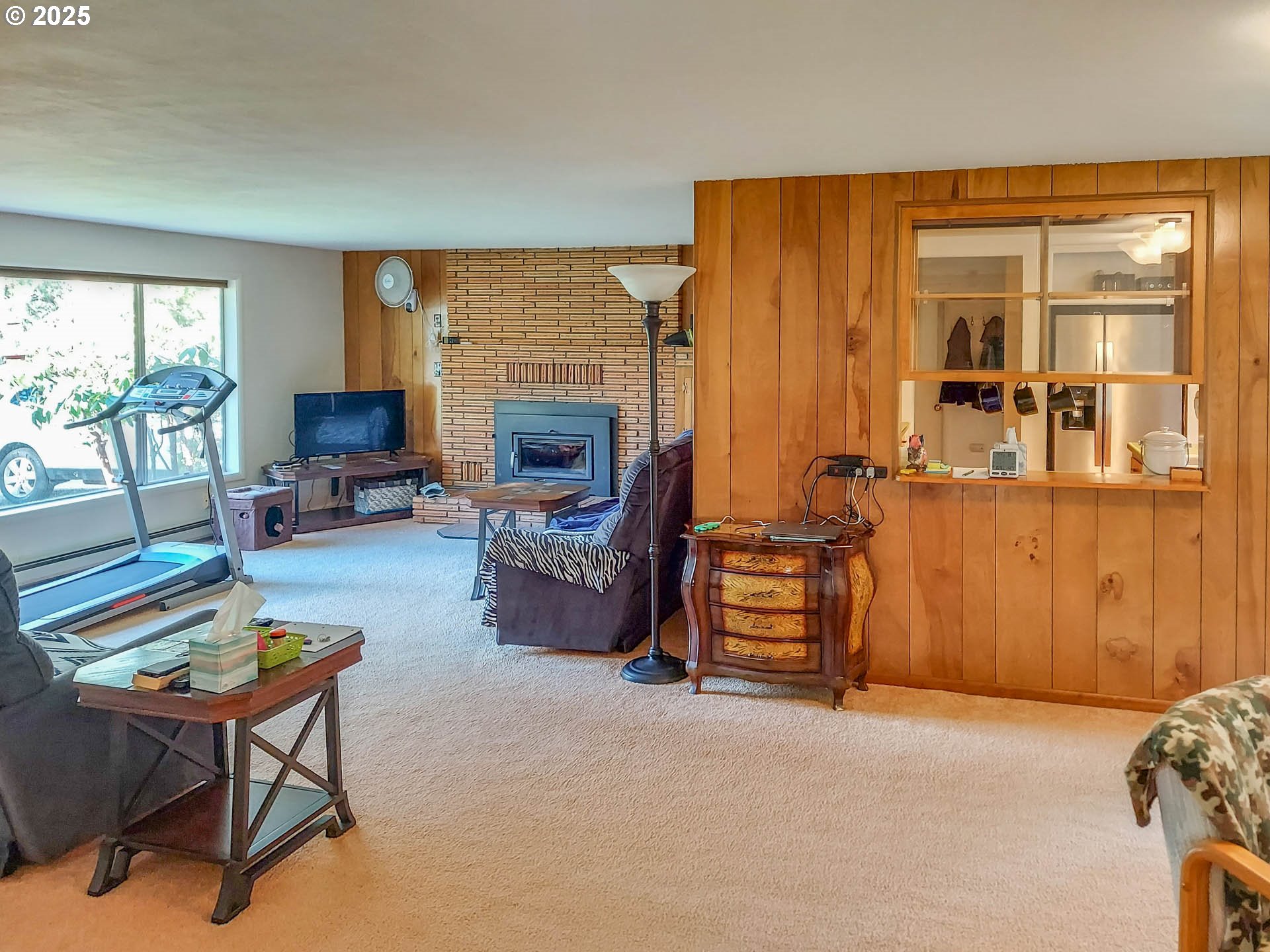 1260 Canyonville-Riddle Road Riddle, OR 97469 - Photo 5 of 44 a living room with furniture and a fireplace