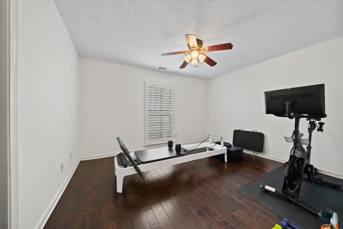 276 Morton Road Collierville, TN 38017 - Photo 16 of 33 a room with gym equipment and windows