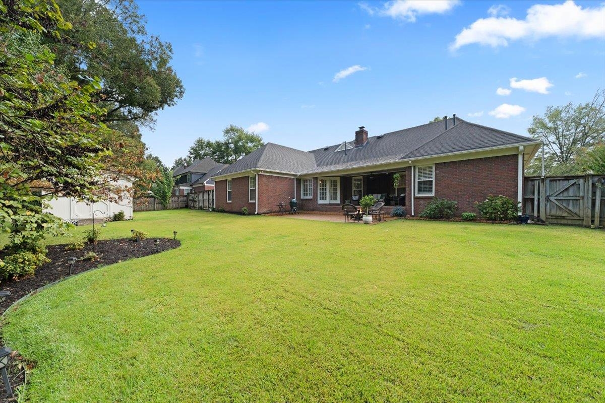 276 Morton Road Collierville, TN 38017 - Photo 26 of 33 a front view of a house with garden