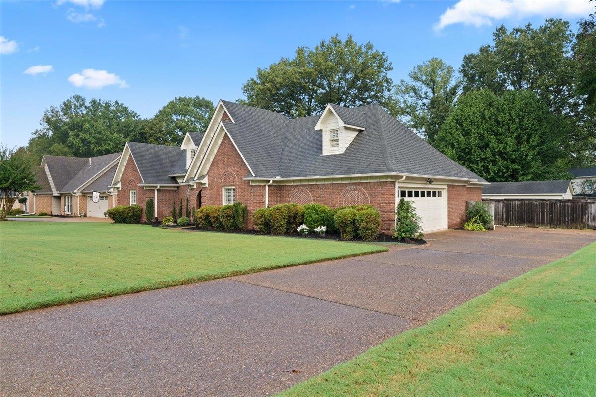 276 Morton Road Collierville, TN 38017 - Photo 29 of 33 a front view of house with yard and green space