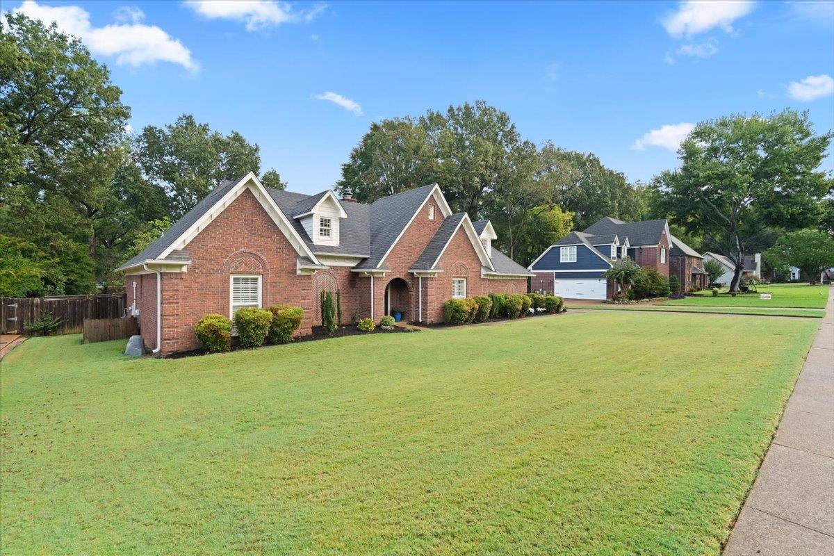 276 Morton Road Collierville, TN 38017 - Photo 30 of 33 a front view of a house with yard