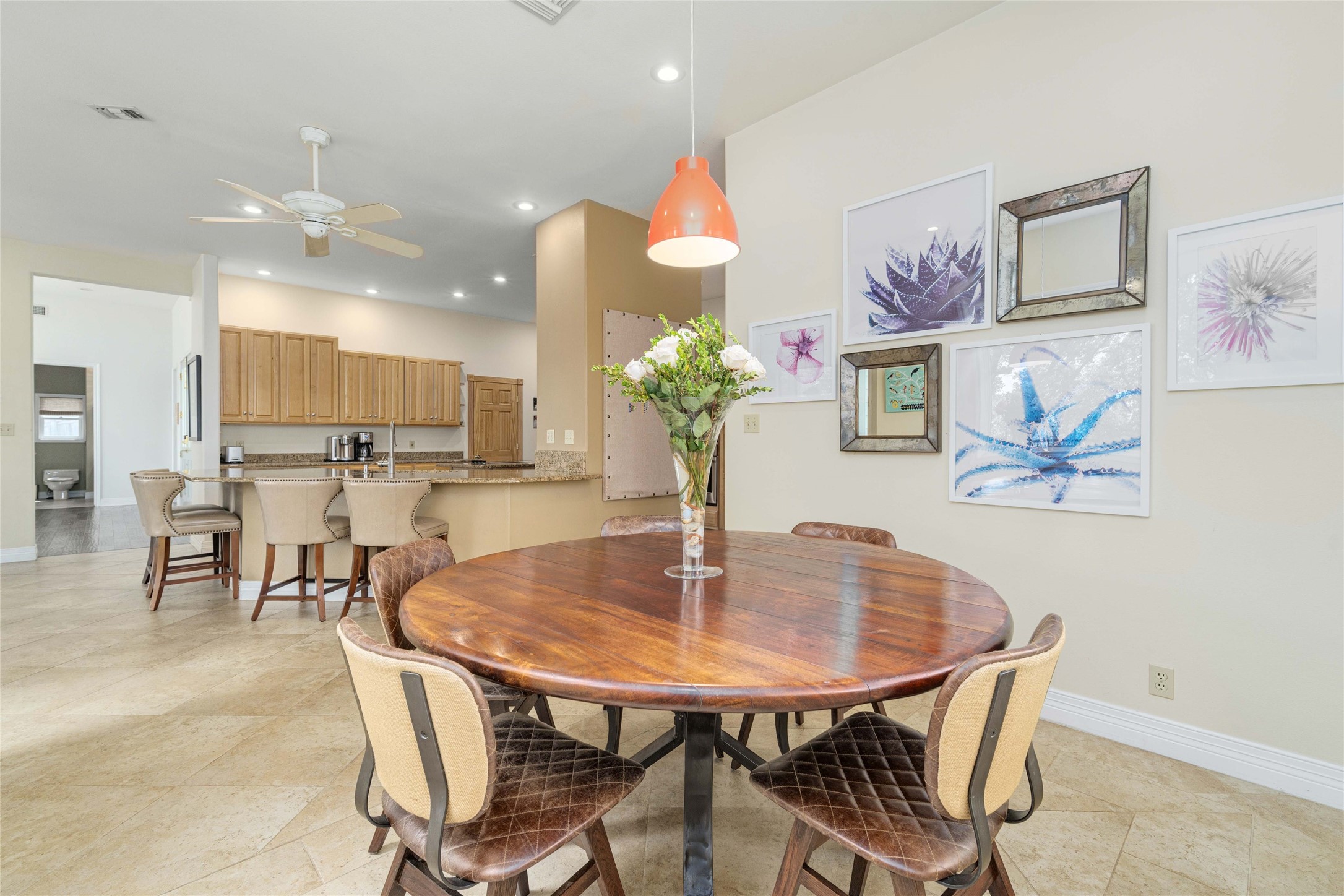 2102 Paisano Road Austin, TX 78746 - Photo 22 of 26 Dining room with ceiling fan and recessed lighting