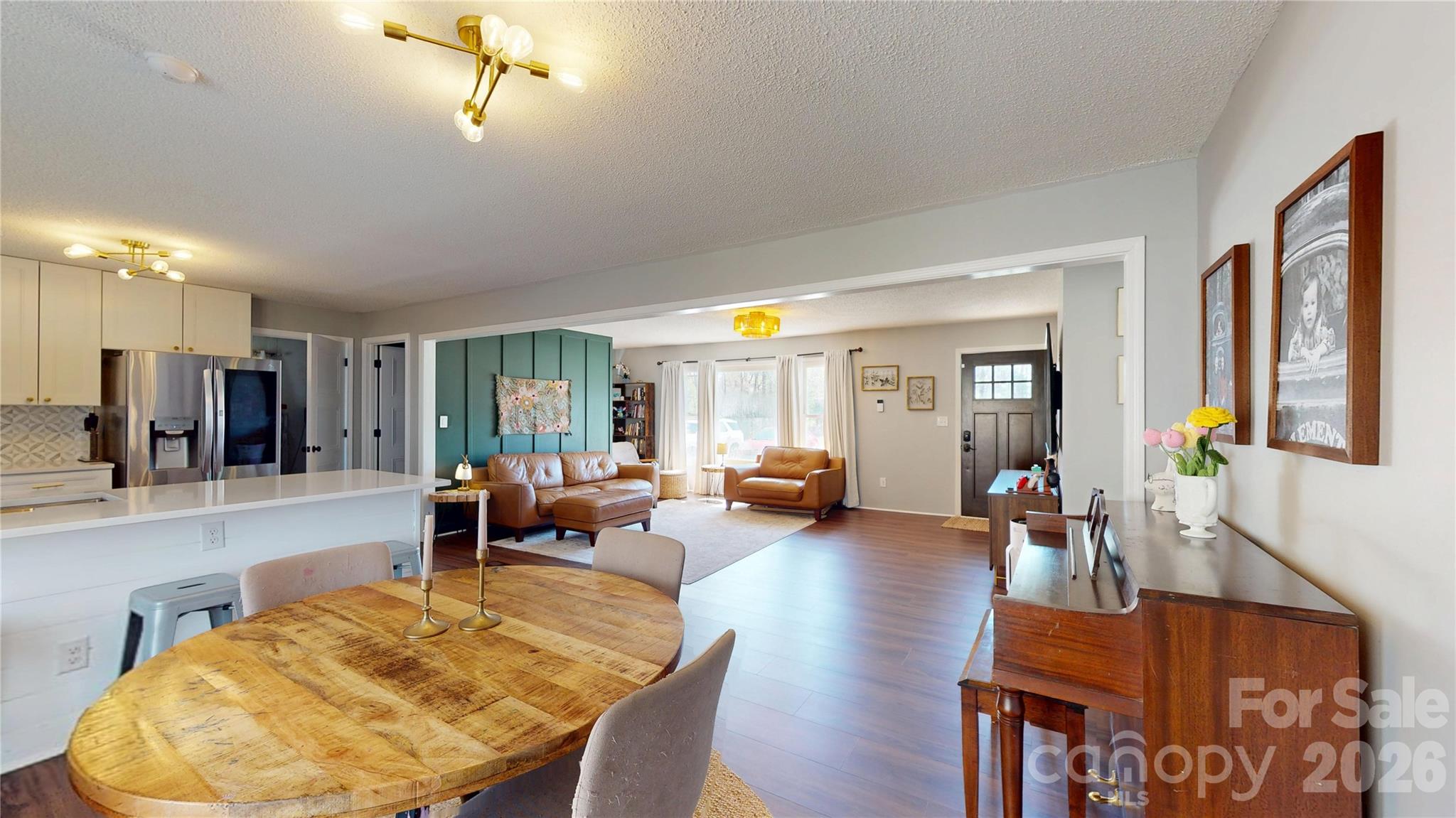 2992 Greenleaf Road Clover, SC 29710 - Photo 13 of 34 a living room with furniture and a chandelier
