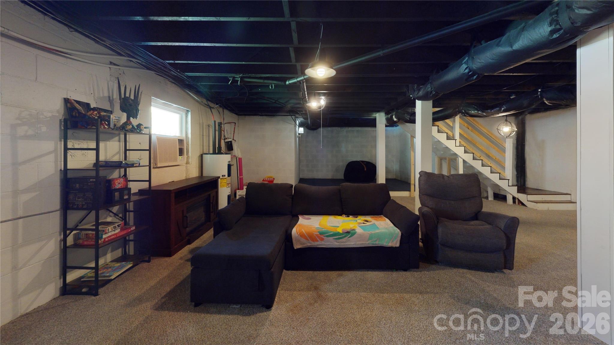 2992 Greenleaf Road Clover, SC 29710 - Photo 21 of 34 a living room with furniture and a wooden floor