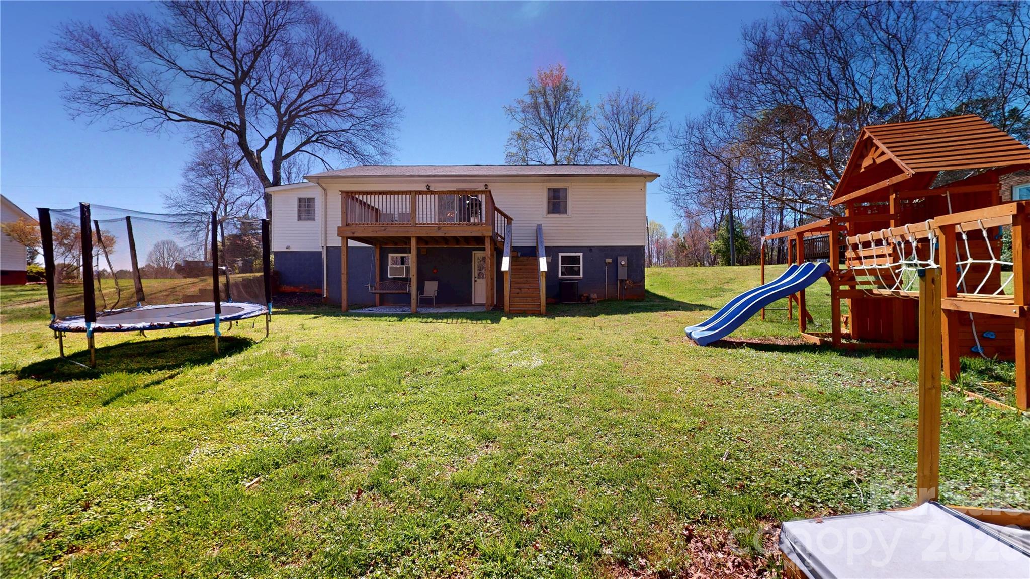 2992 Greenleaf Road Clover, SC 29710 - Photo 30 of 34 a view of a house with swimming pool and sitting area