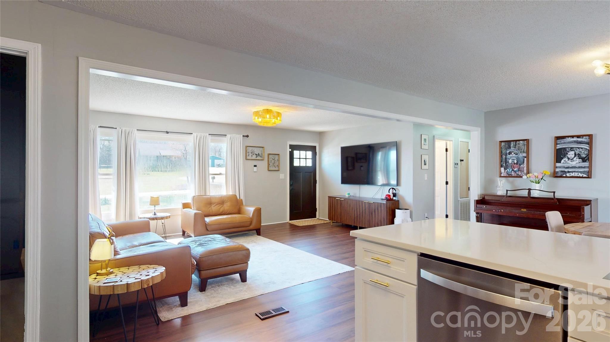 2992 Greenleaf Road Clover, SC 29710 - Photo 7 of 34 a living room with furniture and a table
