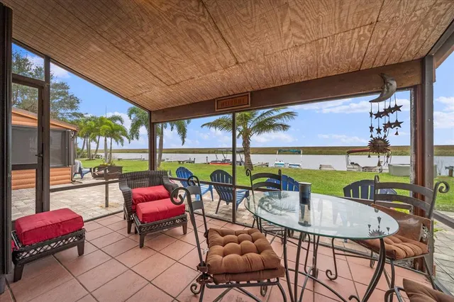 a view of a swimming pool and lounge chair