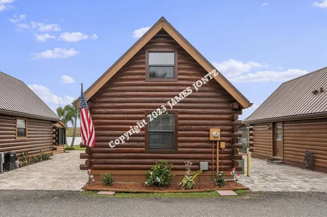 a front view of a house with garage