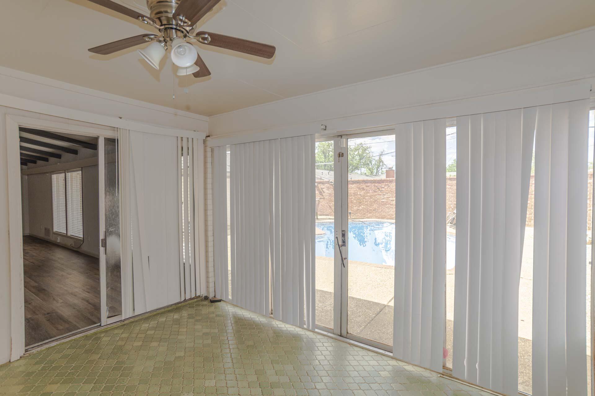 2136 57th Street Lubbock, TX 79412 - Photo 22 of 41 a view of an empty room with a window