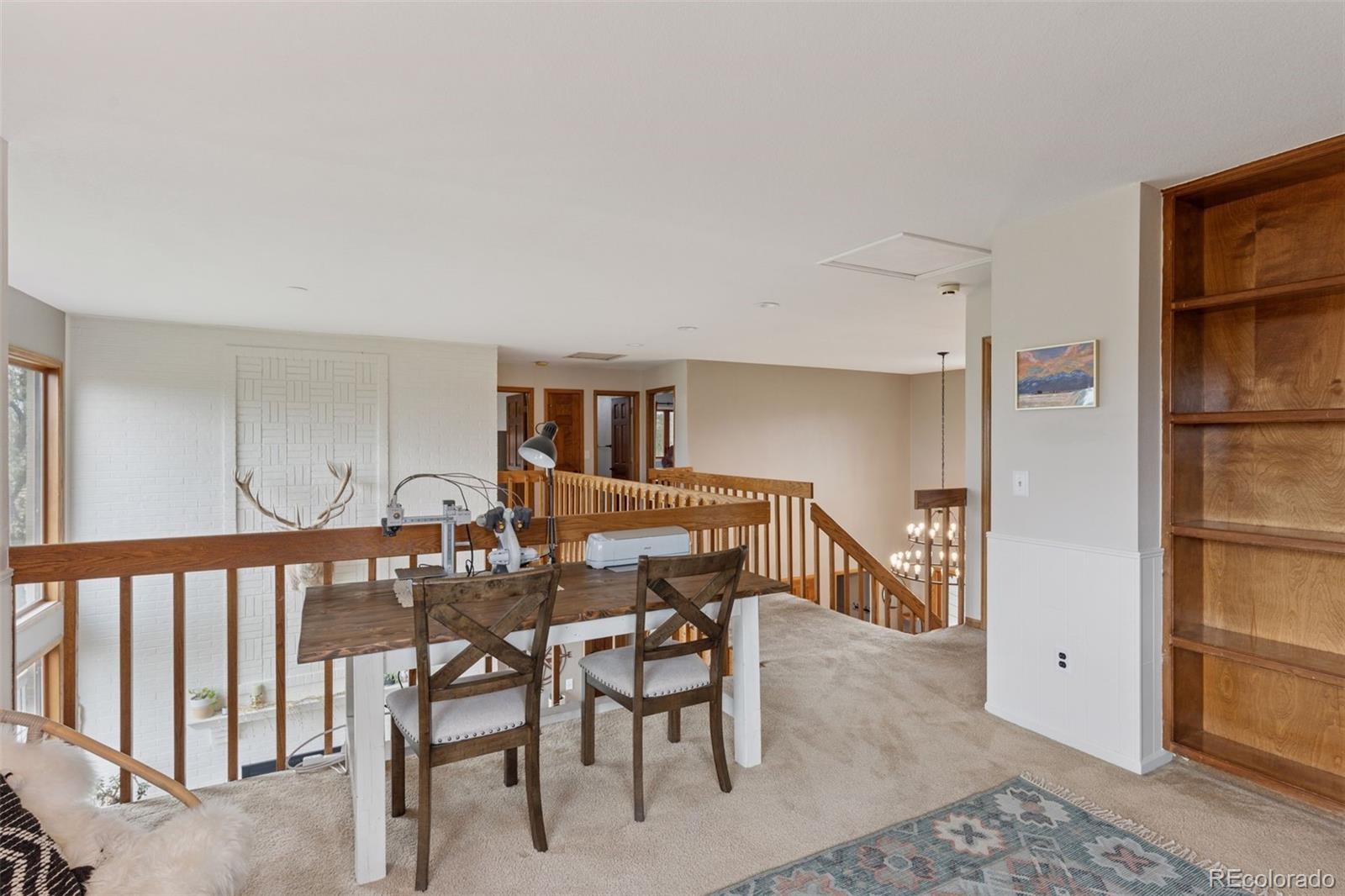 7501 Stroh Road Parker, CO 80134 - Photo 27 of 49 a view of a dining room with furniture