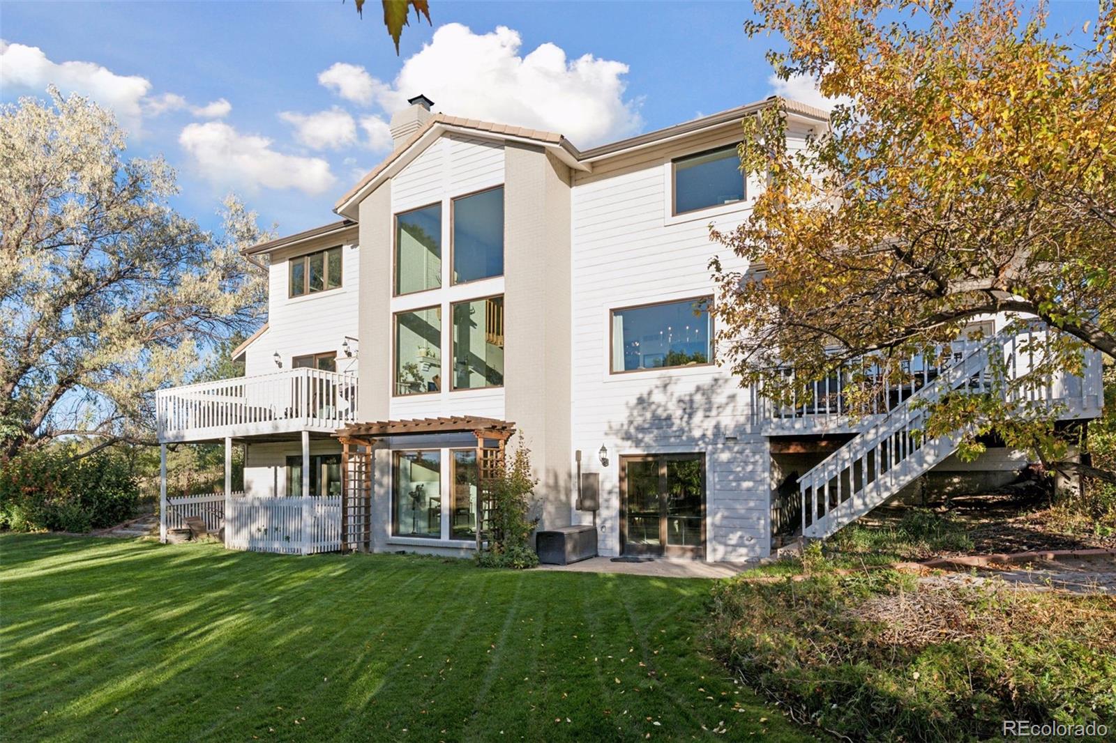 7501 Stroh Road Parker, CO 80134 - Photo 36 of 49 a view of a house with a yard