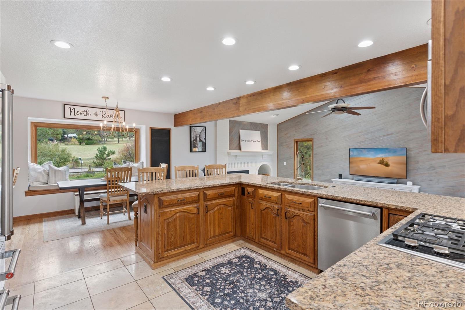 7501 Stroh Road Parker, CO 80134 - Photo 7 of 49 a kitchen with a sink and cabinets