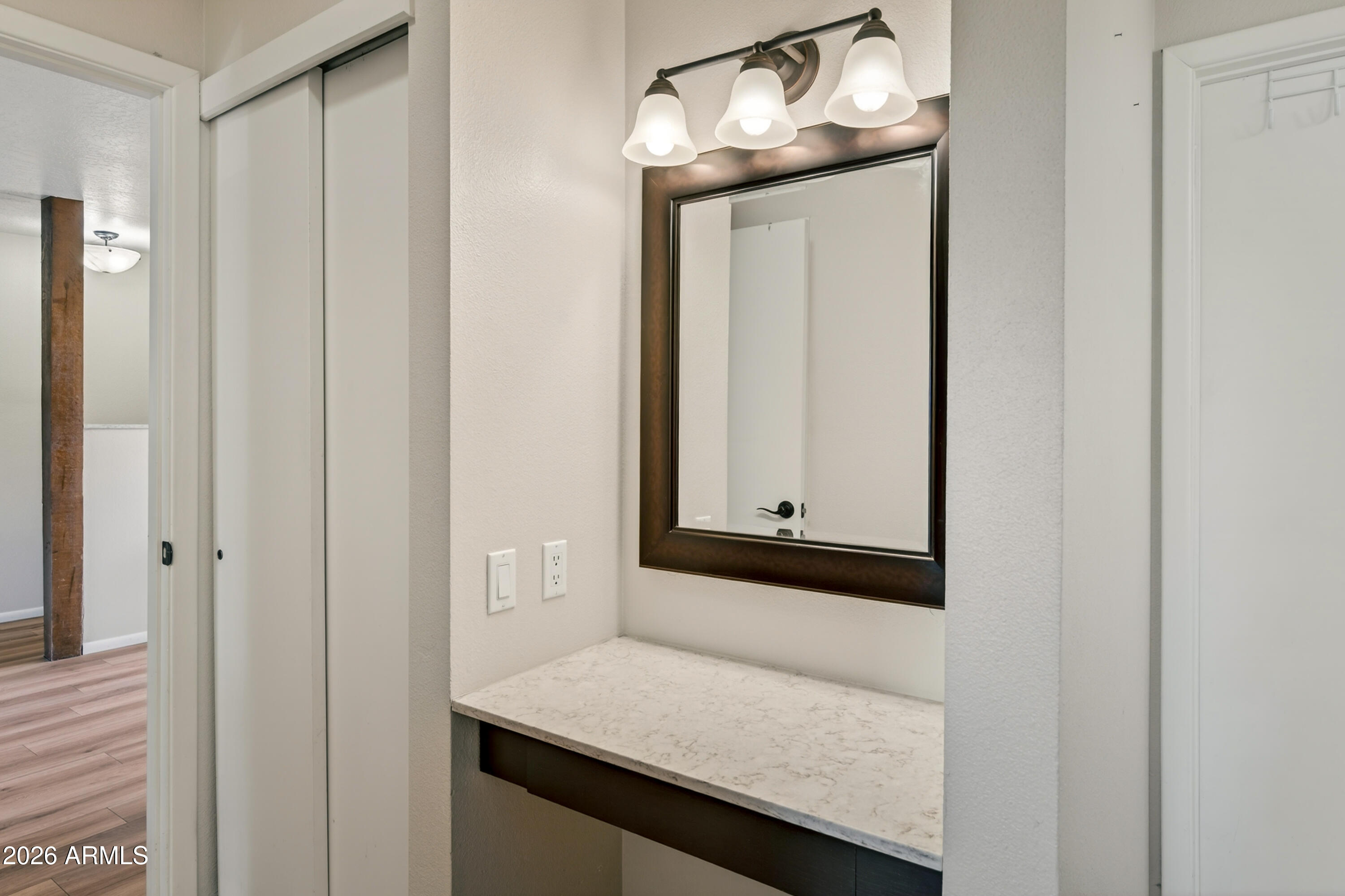 65 Verde Valley School Road, Unit D15 Sedona, AZ 86351 - Photo 12 of 27 a bathroom with a granite countertop sink and a mirror