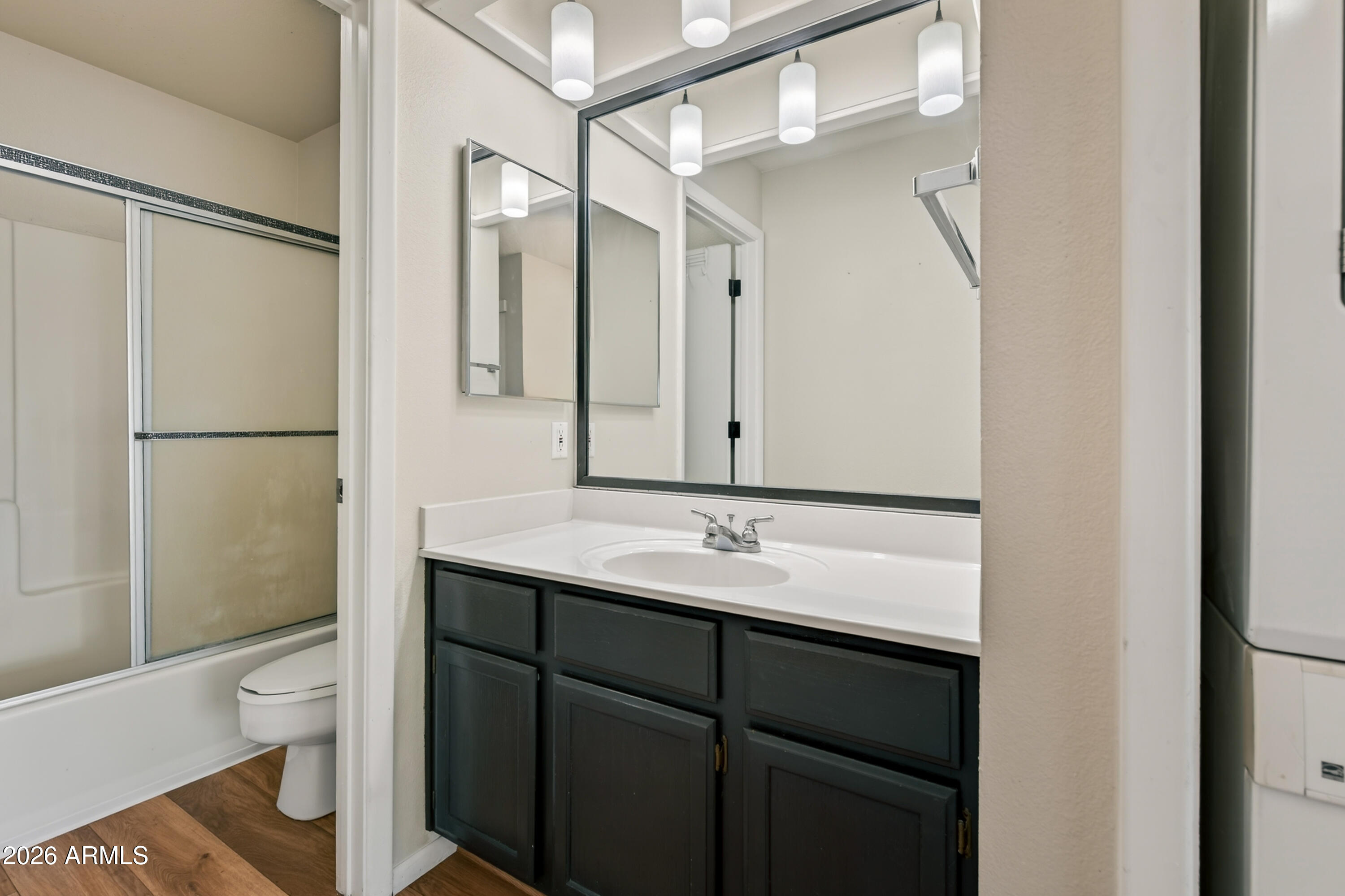 65 Verde Valley School Road, Unit D15 Sedona, AZ 86351 - Photo 15 of 27 a bathroom with a sink a toilet and a mirror