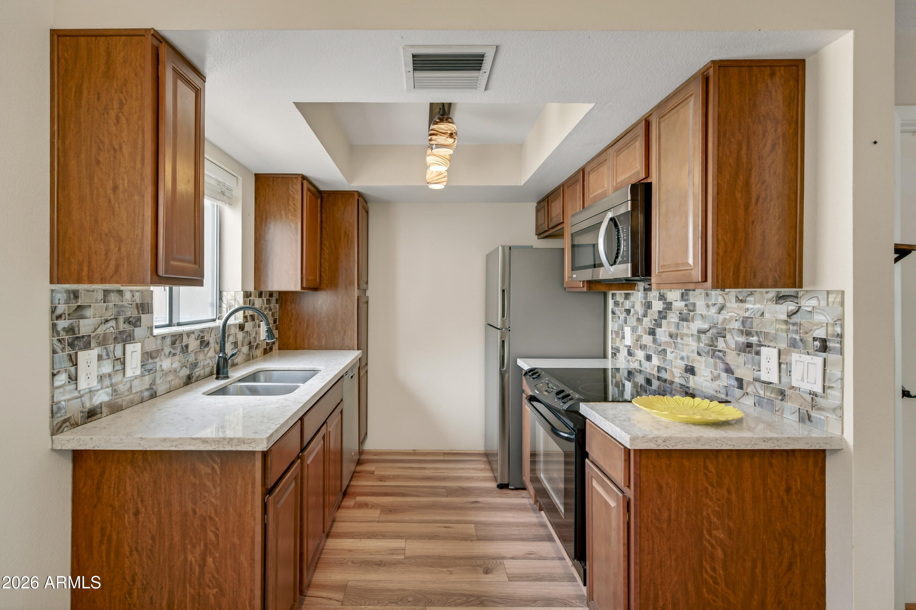 65 Verde Valley School Road, Unit D15 Sedona, AZ 86351 - Photo 7 of 27 a bathroom with a sink a vanity and a mirror