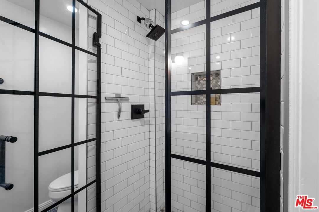 2160 Century Park East, Unit 211 Los Angeles, CA 90067 - Photo 16 of 24 a bathroom with a shower